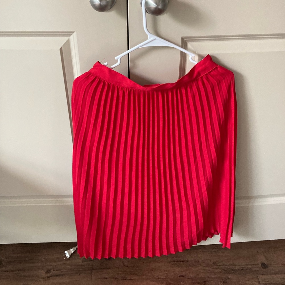 Red pleated midi skirt